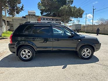 reduktor motor: Hyundai Tucson: 2 l | 2009 il Ofrouder/SUV — 10