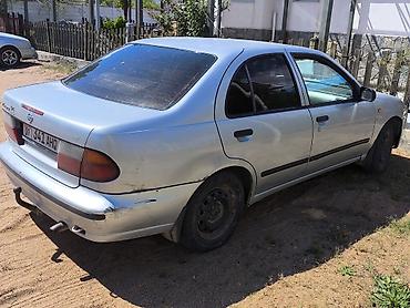 нур мото: Nissan Almera: 1995 г., Механика, Бензин, Седан — 5