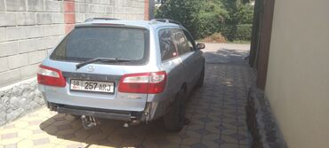 плуг для трактора мтз 82: Универсал Mazda Familia, серебристого цвета. Этот автомобиль
