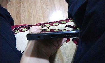 bluetooth qulaqciqlar: Məhsul: Smartfon Təsvir: - Korpus: Qara rəng, düzbucaqlı forma, nazik — 2