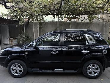 e39 rul: Hyundai Tucson: 2 л | 2009 г. Кроссовер — 3
