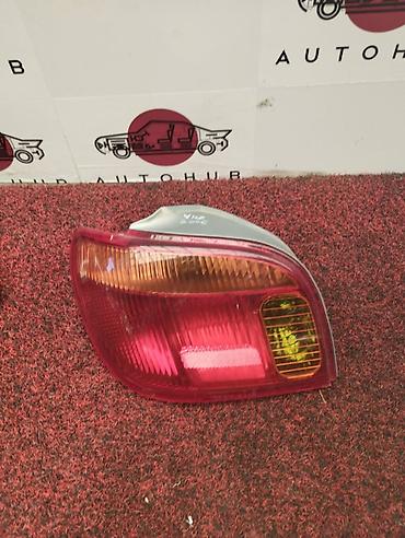 vitz: Фонарь заднего хода левый для TOYOTA Vitz, год выпуска авто: 2005. - — 1