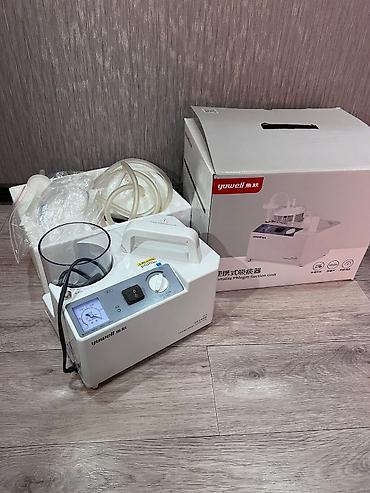 Детская гигиена и уход: Переносной отсасыватель мокроты Yuwell (Portable Phlegm Suction Unit — 2