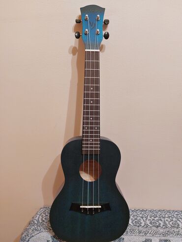каподастр для гитары: Продаю новое укулеле концерт в идеальном состоянии. Прилагается