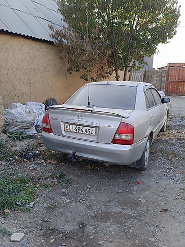 subaru impreza 2003: Mazda 323: 2003 г., 1.6 л, Механика, Бензин, Седан — 4