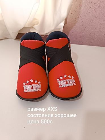 Шлемы: Продаю б.у амуницию для тхэквондо, совсем изношенных нет, пятна на — 7