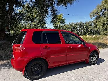 даф 2011: Mazda Demio: 2003 г., 1.3 л, Автомат, Бензин — 5