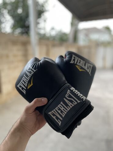 Əlcəklər: Original Everlast MMA pro style muay thai gloves. 12 Oz-dur. 4 il