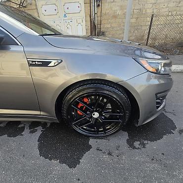 kia optima spoyler: Kia Optima Turbo – sedan Xüsusiyyətlər: - Turbo benzin mühərriki — 1
