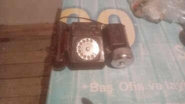 Tikiş maşınları: Stasionar telefon Simli