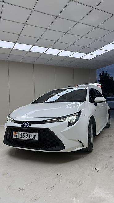 Продажа авто: Toyota Corolla: 2023 г., 1.8 л, Вариатор, Гибрид, Седан — 2