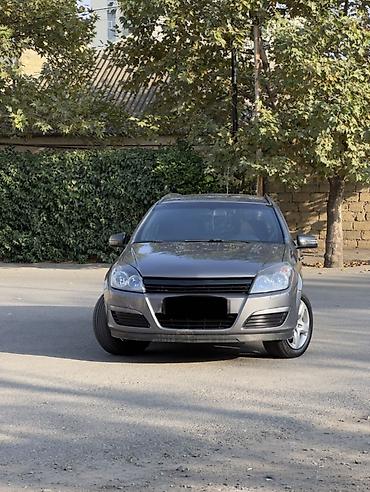 mesok satisi: Opel Astra H Caravan (universal) – boz rəngdə, 5 qapılı — 1