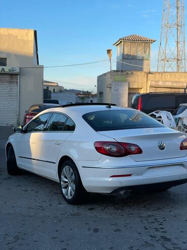 Volkswagen: Volkswagen Passat CC – ağ rəngli, zərif 4 qapılı kupe-sedan. Xarici — 6