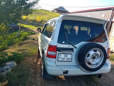 Mitsubishi: Mitsubishi Pajero iO 5 qapı SUV - Kuzov: ağ rəng, 5 qapı, arxa qapıda — 2