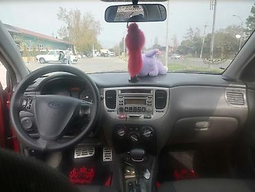 saipa saina lizing: Kia Pride LX sedan – qırmızı rəngdə, avtomatik sürətlər qutusu maşinin — 3
