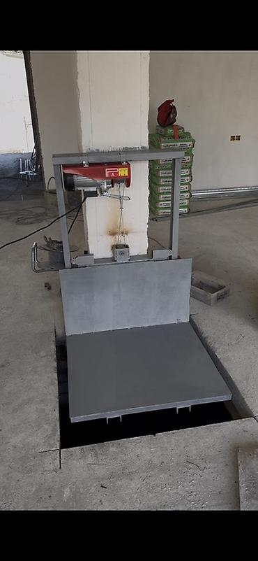 lövhə şəkilləri: Məhsul: Elektriklə işləyən mini yükgötürən/lift platforması — 1