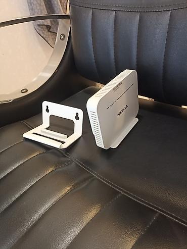 nokia xl: Nokia GPON/ONT Wi‑Fi router Xüsusiyyətlər: - Brend: Nokia - Tip — 2