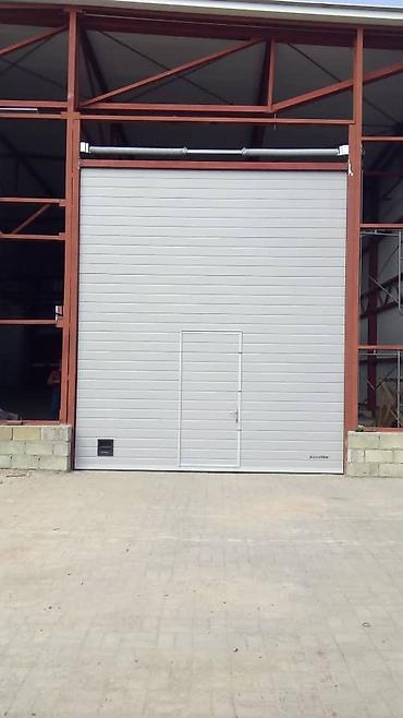 Секционные ворота: Установка секционных ворот – универсальный вариант закрытия проема для — 10