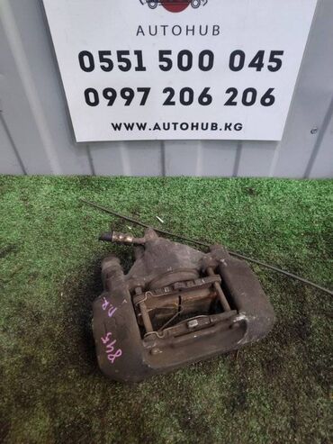 Передние фары: Передний правый суппорт Mazda at lalafo.kg Передние фары: Передний правый суппорт Mazda