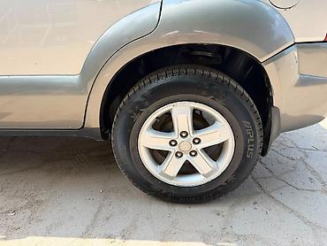вампер нексия: Hyundai Tucson: 2009 г., 2 л, Автомат, Дизель, Кроссовер — 6
