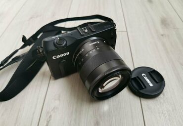 объектив фотоаппарата: Canon EOS M + доп. объектив и доп. батарея. Легeндapный фотoaппaрат