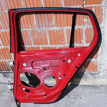 polo auto: GOLF 5 ZADNJA DESNA VRATA RAM CRVENA LY3D | Zadnja desna vrata ram — 1