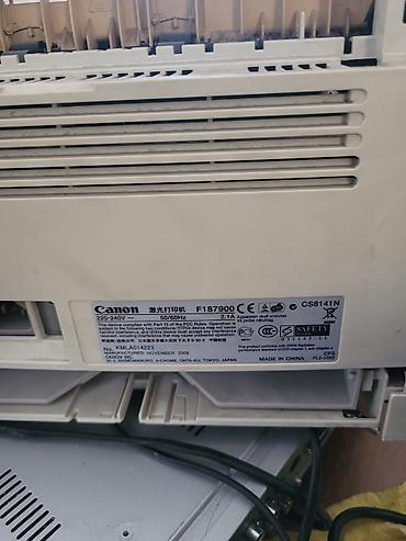 Принтеры: Лазерный принтер Canon. Настольный принтер в корпусе светлого цвета — 2