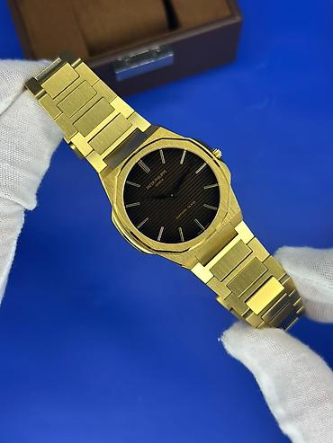 3d saat: Patek Philippe Geneve qol saatı – qızılı rəng, klassik minimalist — 10