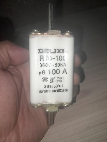 Трансформатор үчүн сактагычтар: Плавкий предохранитель DELIXI RT0-100 - Номинальный ток: 100 A (gG) - — 1