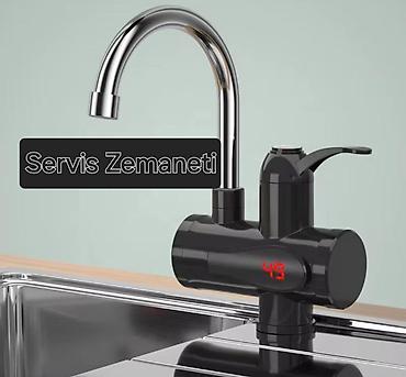 Rəqəmsal göstəricili sürətli su qızdırıcılı krant Rusiyanindi. Servis