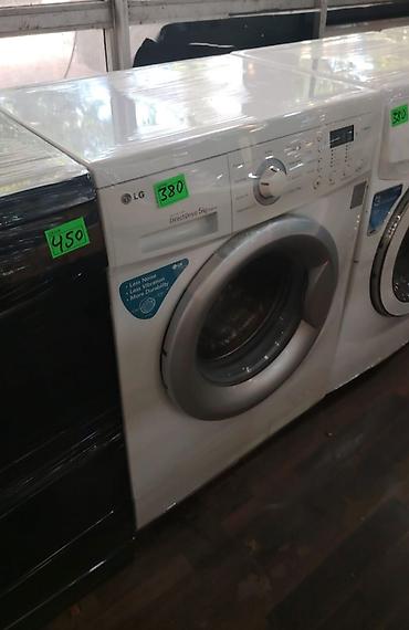 LG paltaryuyan maşın, ön yükləməli model. Üzərində “Direct Drive 5 kg”