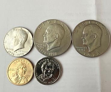 Sikkələr: ABŞ xatirə sikkələri dəsti Tərkib: - 2 ədəd Eisenhower One Dollar — 1