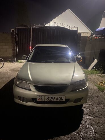мвзда демио: Mazda 323: 2000 г., 1.6 л, Автомат, Бензин, Седан