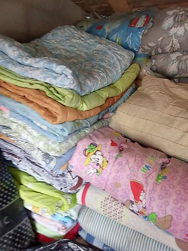 Текстиль: Детские одеяла с яркими принтами - Мягкие тёплые одеяла, свернутые в — 1