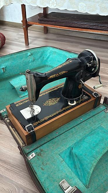 golf masini: Portativ mexaniki tikiş maşını – qolu ilə fırladılan model - Korpus — 3