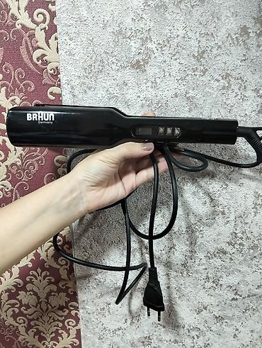 Braun saç ütüsü (Almaniya) - Rəng: qara - Elektriklə işləyir, 2 pinli