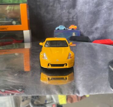 Avtomobil modelləri: Коллекционная модель Nissan 370Z Z34 yellow 2008 DeAgostini Scale — 3