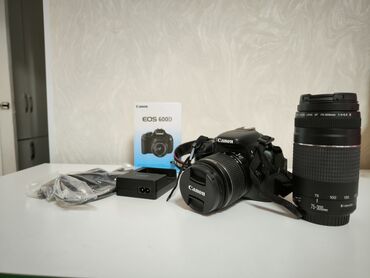 Фотоаппараты: Продаю профессиональную камеру Canon 600D с дополнительным