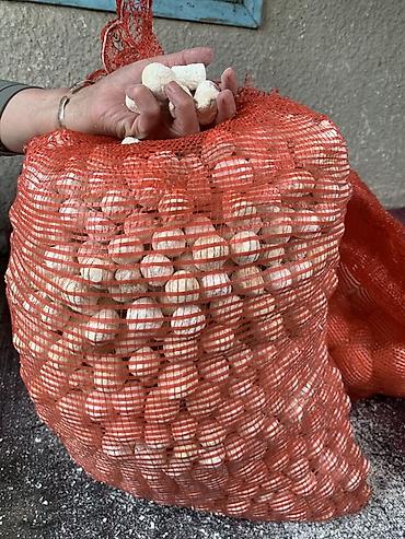 Продукты питания: Сухие шарики из творога (курт/сушёный сыр) в сетчатых мешках — 1