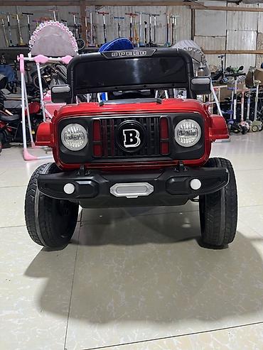Uşaq üçün elektrikli off-road maşın - Korpus: qırmızı-qara rəngdə