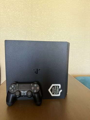 плейстейшен 4 слим: PlayStation 4 Pro (1TB) – Əla vəziyyətdə! PlayStation 4 Pro •