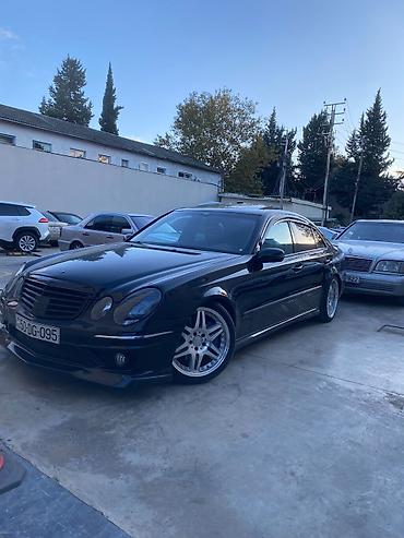 mercedes sekilleri: Mercedes-Benz E‑Class (W211) sedan – qara rəng, AMG üslublu eksteryer — 10