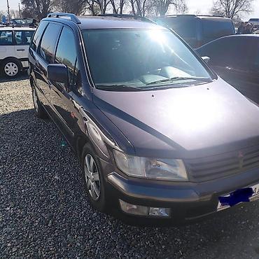 керме тоо: Mitsubishi Space Wagon: 1999 г., 2.4 л, Кол менен иштөөчү, Бензин, Вэн/Минивэн — 4