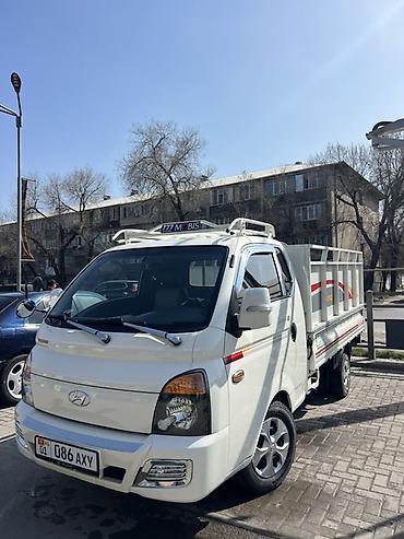 kiya bongo: Hyundai Porter II (бортовой малотоннажный грузовик) - Компактный — 10