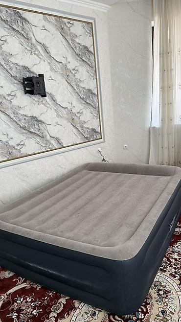 нодом: Надувная кровать Intex Характеристики: - Размер: 152 × 203 × 42 см — 1