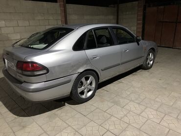 Mazda: Mazda Capella: 1998 г., 2 л, Механика, Бензин, Хэтчбэк