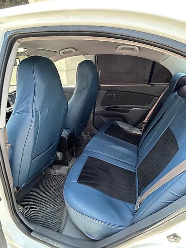 aftomobil: Kia Rio: 1.4 l | 2010 il Sedan — 5