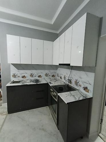 Кухонные гарнитуры: Угловой кухонный гарнитур в современном минималистичном стиле - — 9