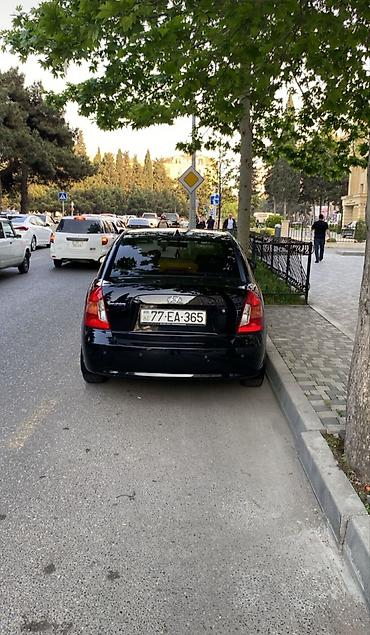 bmw e39 disk teker: Hyundai Accent: 1.4 l | 2006 il Sedan — 5