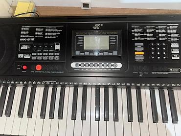 elektron gitara: MK-812 elektron sintezator – 61 tam ölçülü klaviş – Daxili ikili — 6